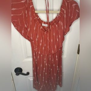 Cute off the shoulder romper with tie waist!